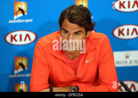 Melbourne, Australia. Xi gen, 2014. Roger Federer reagisce durante la conferenza stampa in vista del Australian Open di tennis nel torneo di Melbourne, Australia, 11 gennaio 2014. Credito: Xu Yanyan/Xinhua/Alamy Live News Foto Stock