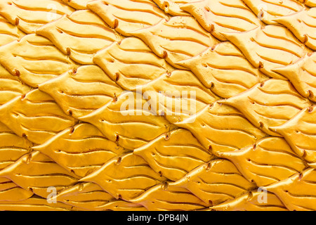 Scala dorata di naga statua , il tessuto Foto Stock