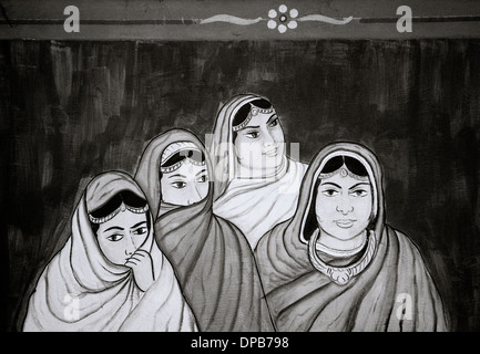 Arte di strada in Udaipur nel Rajasthan in India in Asia del Sud. Urban Graffiti donna donne musulmani islam musulmani cultura islamica velo persone Foto Stock