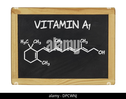 Formula chimica della vitamina a su una lavagna Foto Stock