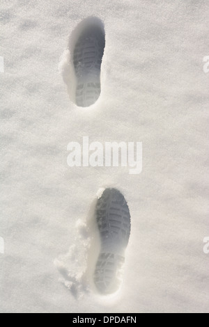 Stampe di calzatura nella neve Foto Stock