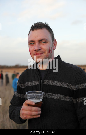 La tradizionale annuale di piombo-fino a, e gioco del cofano Haxy tenutosi in gennaio in North Lincolnshire, England, Regno Unito Foto Stock