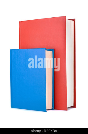Libri di rosso e di blu su sfondo bianco Foto Stock
