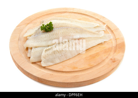 La Passera di mare con prezzemolo su legno isolato su bianco Foto Stock