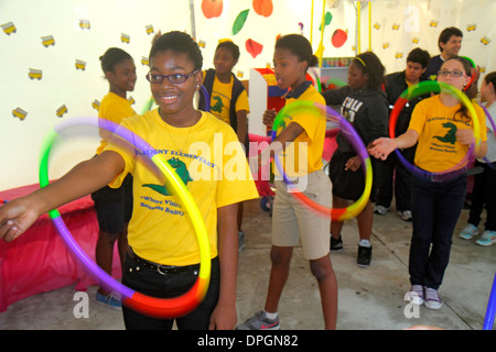 Miami Florida,Book Fair International,Miami Dade College,evento,festival,Children's Alley,hoola hoop,Black Blacks African Africans Ethnic minority,girl Foto Stock