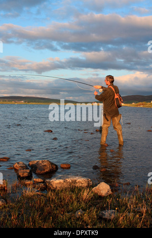 Brown Trout fisherman Foto Stock