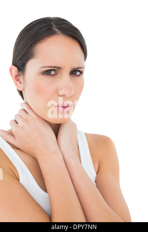 Ritratto di una donna informale che soffrono di mal di collo Foto Stock