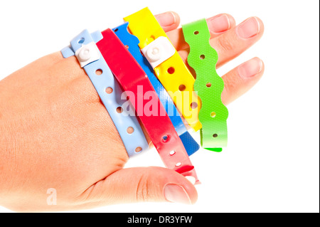 Bracciali pochi alberghi su una mano femminile Foto Stock