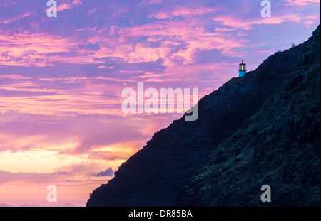 Bella nuvoloso sunrise in Makapuu faro su Oahu, Hawaii Foto Stock