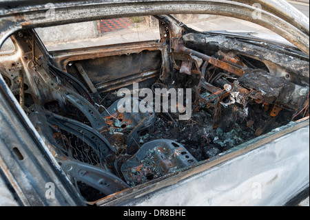Interno di un bruciato auto, London, England, Regno Unito Foto Stock