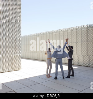 La gente di affari il tifo all'aperto Foto Stock