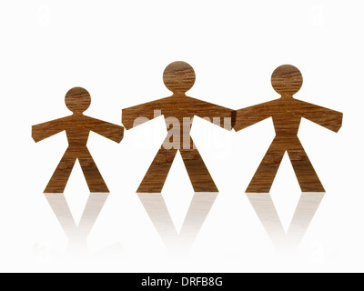 Carta tagliata fuori figure che rappresentano persone famiglia Foto Stock