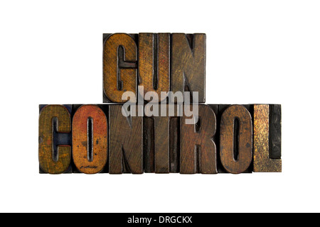 Le parole di controllo pistola scritto in vintage tipo di stampa in rilievo Foto Stock