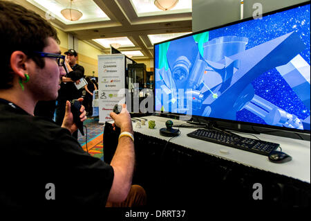 Gen 31, 2014 - di Burbank, California, Stati Uniti - TOM FARINELLA di intrattenimento Sixense costruisce un robot con MakeVR, una applicazione di modellazione per la stampa 3D, durante i due giorni di stampante 3D World Expo presso il Marriott Hotel e Centro Conferenze.(Immagine di credito: © Brian Cahn/ZUMAPRESS.com) Foto Stock