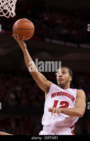 Madison, Wisconsin, Stati Uniti d'America. Il 1° febbraio 2014. 1 febbraio 2014: Wisconsin Badgers guard Traevon Jackson #12 va in per un lay up durante il NCAA pallacanestro tra la Ohio State Buckeyes e Wisconsin Badgers a Kohl Center a Madison, WI. Ohio State sconfitto Wisconsin 59-58. John Fisher/CSM/Alamy Live News Foto Stock