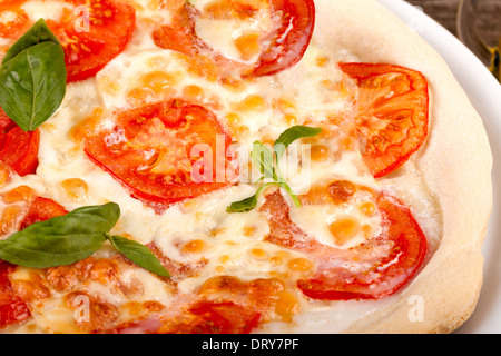 Pizza pomodoro mozzarella Foto Stock