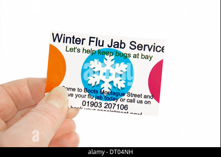 Avvia il farmacista winter flu jab informazioni di servizio carta nel dipartimento di farmacia consigliare di prenotare un appuntamento Foto Stock