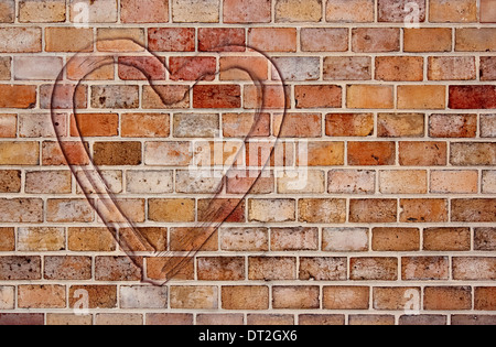 Cuore sul muro di mattoni - dichiarazione di amore Foto Stock