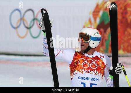 Sochi, Russia. Il 9 febbraio, 2014. Bode Miller DI STATI UNITI D'AMERICA reagisce durante l'uomo in discesa Sci Alpino in Rosa Khutor Alpine Center a Sochi 2014 Giochi Olimpici, Krasnaya Polyana, Russia, 09 febbraio 2014. Foto: Michael Kappeler/dpa Foto Stock