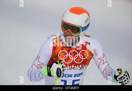 Sochi, Russia. Il 9 febbraio, 2014. Bode Miller DI STATI UNITI D'AMERICA reagisce durante l'uomo in discesa Sci Alpino in Rosa Khutor Alpine Center a Sochi 2014 Giochi Olimpici, Krasnaya Polyana, Russia, 09 febbraio 2014. Foto: Michael Kappeler/dpa Foto Stock