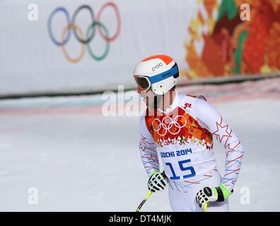 Sochi, Russia. Il 9 febbraio, 2014. Bode Miller DI STATI UNITI D'AMERICA reagisce durante l'uomo in discesa Sci Alpino in Rosa Khutor Alpine Center a Sochi 2014 Giochi Olimpici, Krasnaya Polyana, Russia, 09 febbraio 2014. Foto: Michael Kappeler/dpa Foto Stock