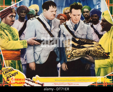 OLIVER HARDY, Stan Laurel, BONNIE SCOZIA, 1935 Foto Stock