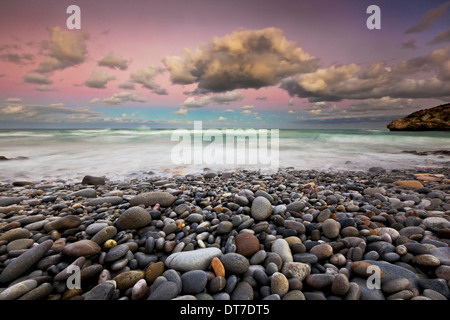 La vista sul mare punto più australe dell Africa Cape Agulhas in Sud Africa al tramonto Cape Agulhas Arniston Sud Africa Foto Stock