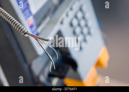 Rotture di telefono a pagamento. Foto Stock