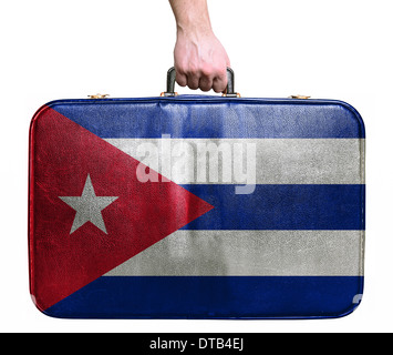 Tourist mano azienda pelle vintage borsa da viaggio con la bandiera di Cuba Foto Stock