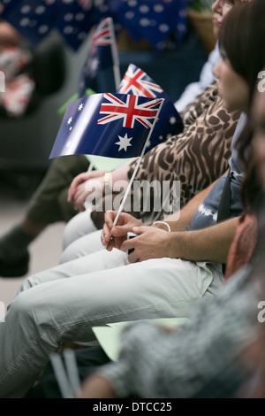 Le persone che frequentano una cittadinanza australiana cerimonia Foto Stock
