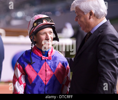 Frankie Dettori il famoso Jockey è in sella al Meydan Racecourse durante il Dubai World Cup Carnival Foto Stock