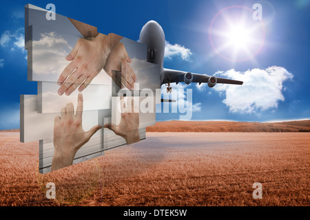 Immagine composita delle mani facendo una casa sulla schermata astratto Foto Stock