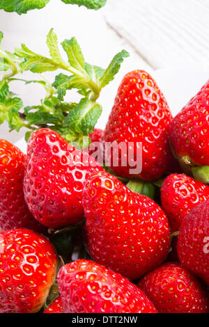 Fragole e conia Foto Stock