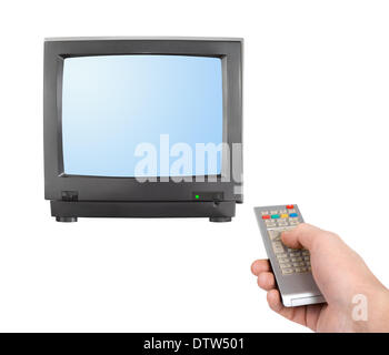 Mano con telecomando e tv Foto Stock