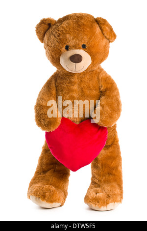 Orsacchiotto di peluche con cuore rosso su sfondo bianco Foto Stock