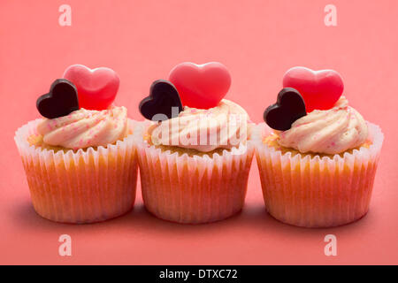 Tre tortini di San Valentino in una riga Foto Stock