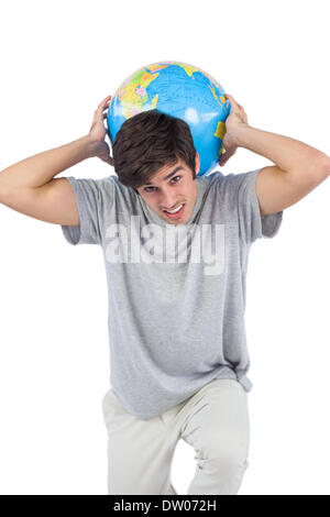 L'uomo tenendo un globo sulla sua schiena Foto Stock