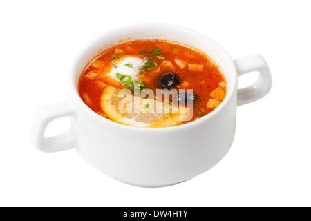 Zuppa con carne e verdure in vaso bianco Foto Stock