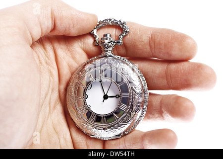 Mano azienda vintage pocket watch isolati su sfondo bianco Foto Stock