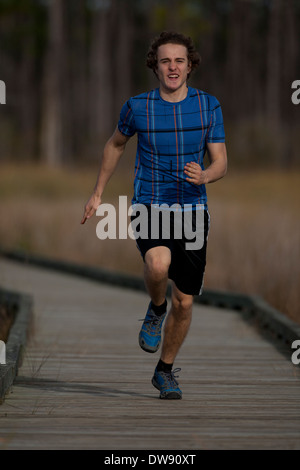 Ragazzo in esecuzione, Louisiana, 16 anni Foto Stock