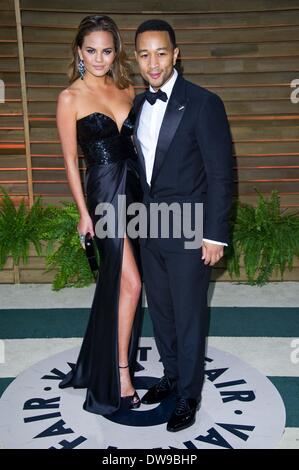JOHN LEGEND & moglie Christine TEIGEN 2014 Vanity Fair LOS ANGELES STATI UNITI D'AMERICA 03 Marzo 2014 Foto Stock