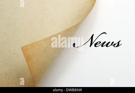 News testo dietro la carta Foto Stock