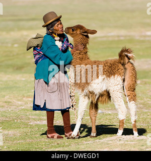 Donna con Llama Foto Stock