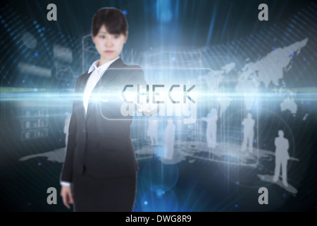 Controllare contro il futuristico sfondo nero Foto Stock