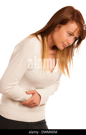 Il dolore di stomaco - Brunette con stomachache isolato Foto Stock