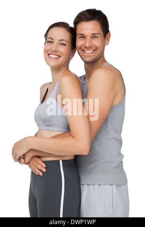 Lato ritratto di un felice fit coppia giovane Foto Stock