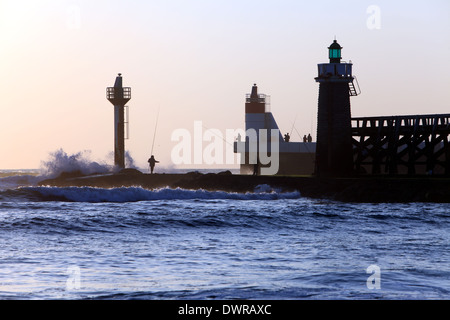 Tramonto a Capbreton, vista del faro e la Estacade, Les Landes, Francia Foto Stock