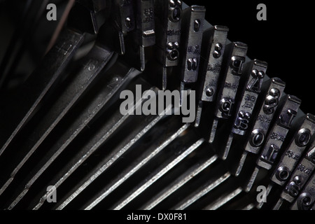 Vecchio tipo di macchina da scrivere barre, sfondo meccanico Foto Stock