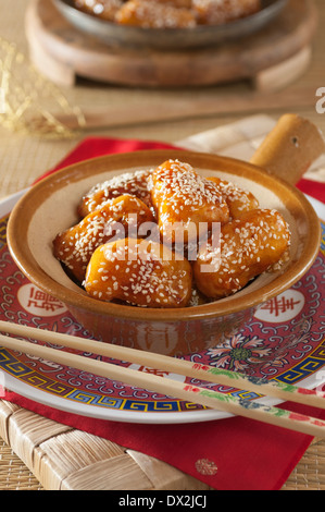 Toffee cinese frittelle di mele Foto Stock