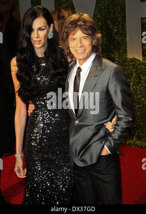 West Hollywood, Los Angeles, Stati Uniti d'America, la domenica. 22 feb 2009. Pietre Rolliong cantante Mick Jagger e sua moglie L?wren Scott arrivano al Vanity Fair Oscar Party al tramonto le torri in West Hollywood, Los Angeles, Stati Uniti d'America, Domenica, 22 febbraio 2009. Foto: Hubert Boesl/dpa/Alamy Live News Foto Stock